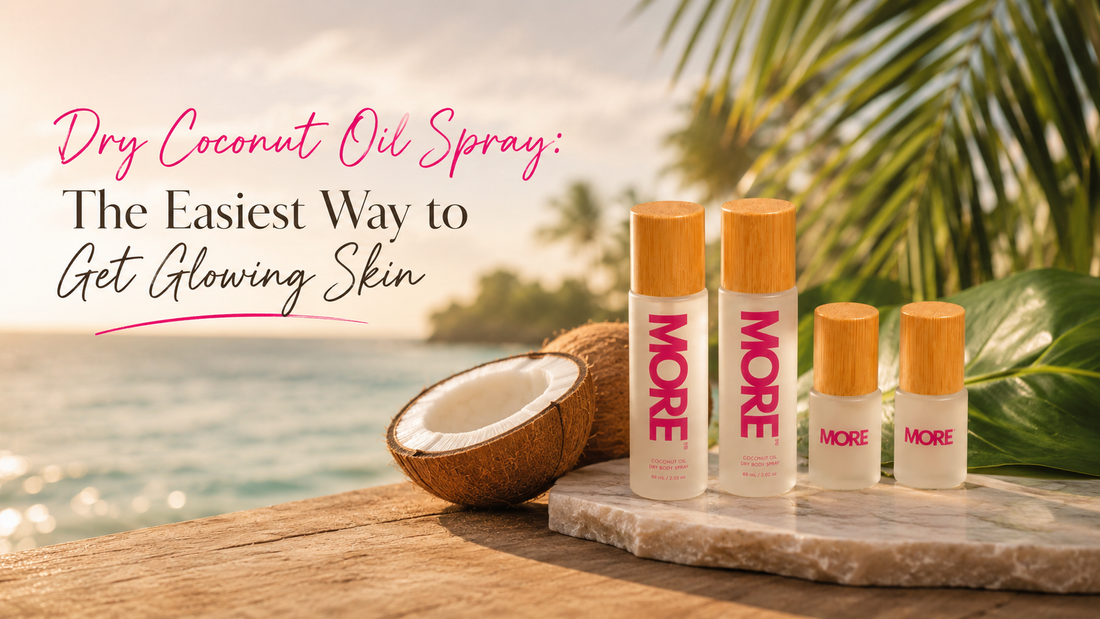 MORE Dry Coconut Oil Spray bottles displayed on a tropical beach at sunset with fresh coconuts and palm leaves, showcasing an easy way to achieve naturally glowing, hydrated skin.